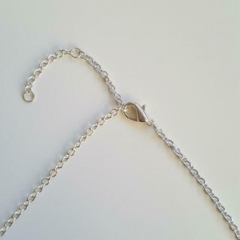 Chique zilveren ketting met turkoois en echte parel hanger