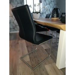 Eetkamer stoel zwart leather look. 8 stuks met slede voet