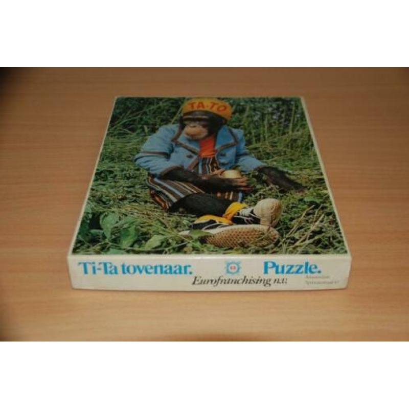 Ti - ta tovenaar. Tafereel. Jig saw puzzle.