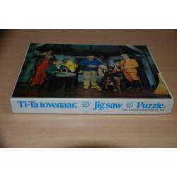 Ti - ta tovenaar. Tafereel. Jig saw puzzle.