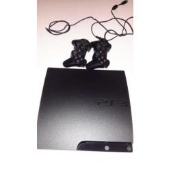 Playstation 3 in doos met 2 controllers + 15 spellen