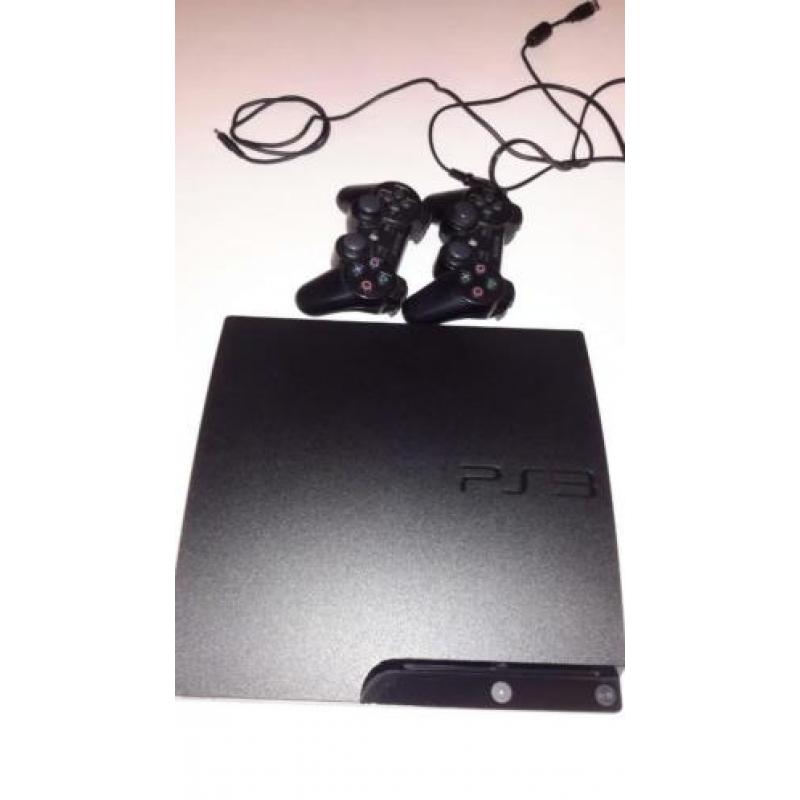 Playstation 3 in doos met 2 controllers + 15 spellen