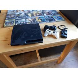 Ps3 met 2 controllers en 29 games