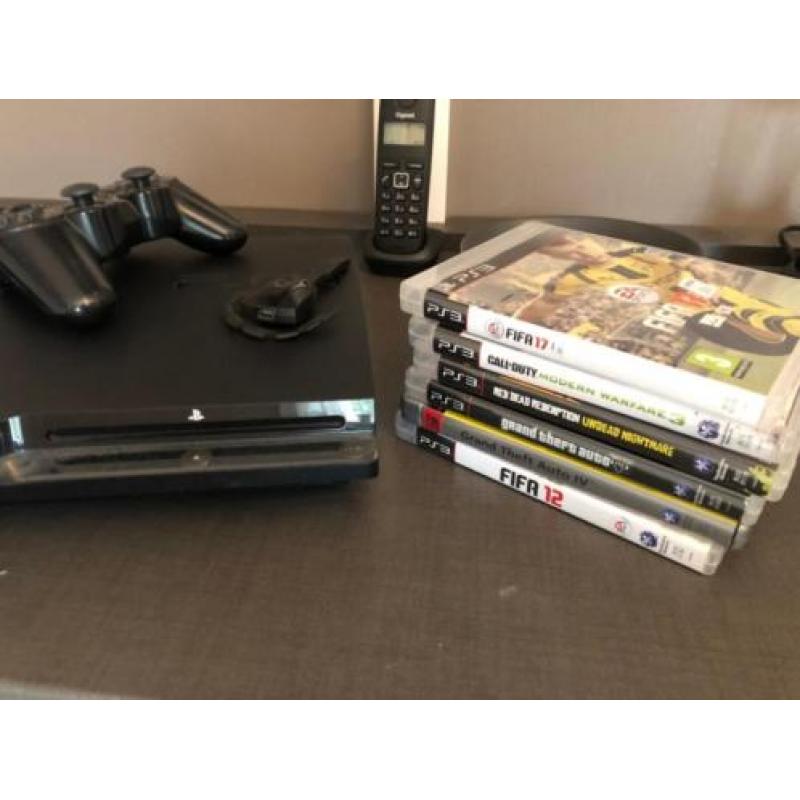 Playstation 3 + diverse spellen.