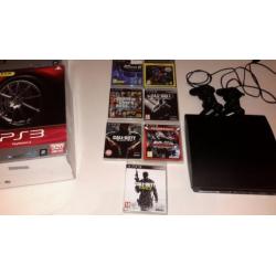 Playstation 3 in doos met 2 controllers + 15 spellen