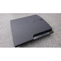 PS3 slim 320 GB met spellen en Singstar microfoons